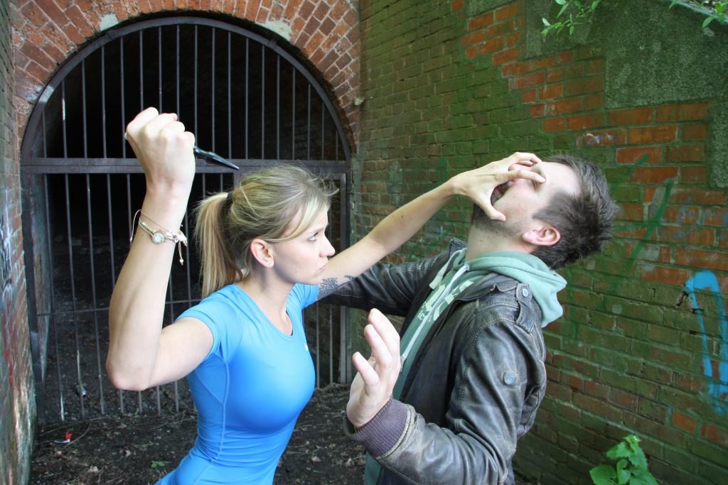 Woman defending herself